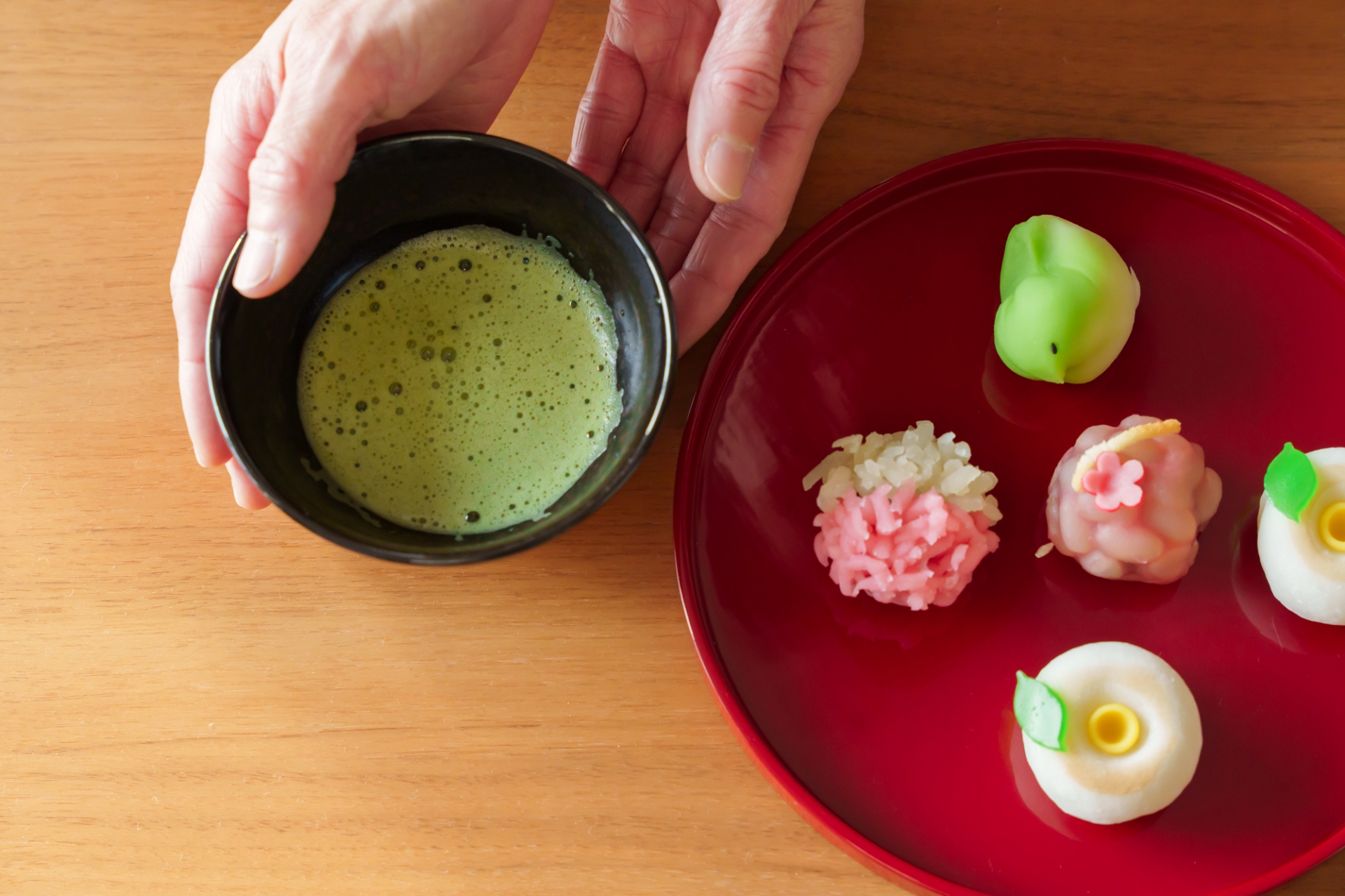 Seasonal Japanese wagashi served with a bowl of matcha